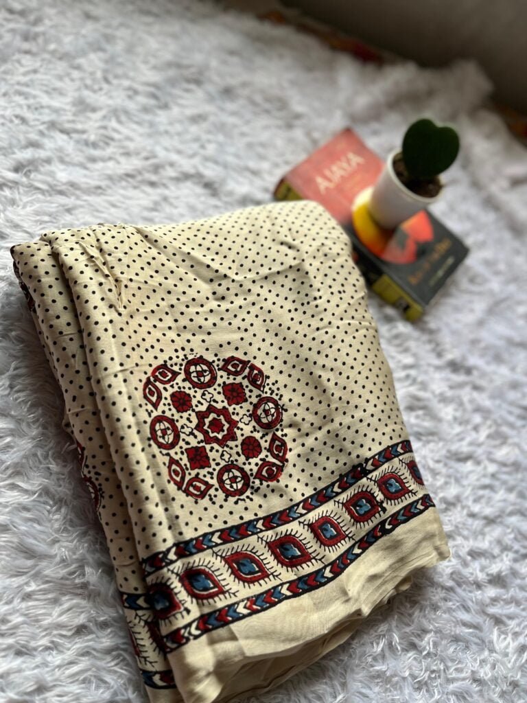 Modal Ajrakh cream saree with maroon and blue block print by Label Iplik